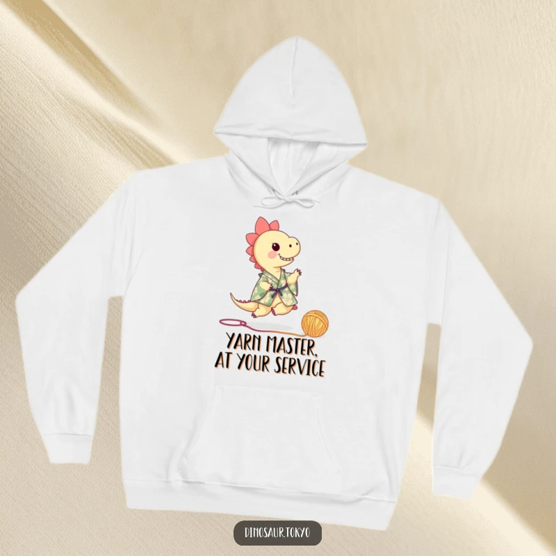 Funny dinosaur in a floral kimono playfully kicking a yarn ball, a cozy hoodie design, bringing humor and warmth.