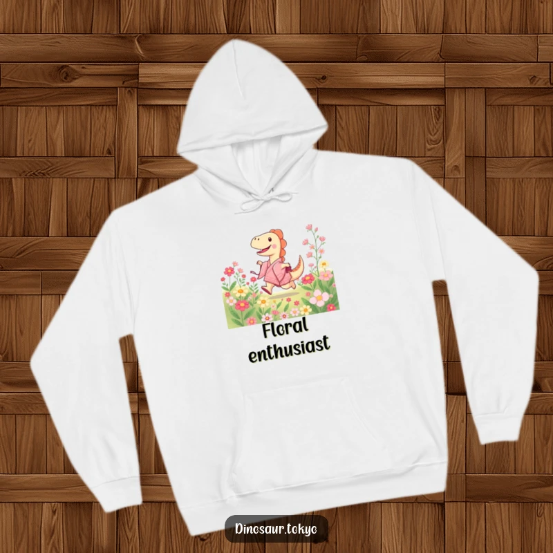 Funny hoodie with a joyful dinosaur in a kimono skipping through a field of blooming flowers, offering comfort and a cheerful vibe.