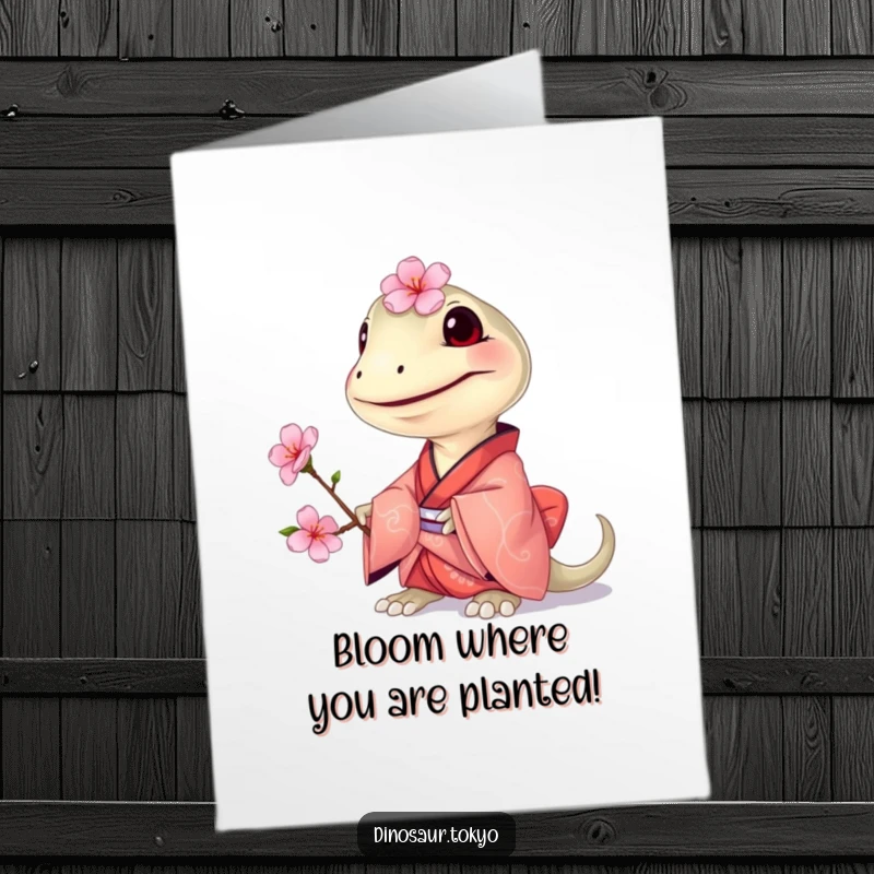 Free Printable Congratulations Card: A grinning Compsognathus in a kimono presents a beautiful cherry blossom to celebrate.