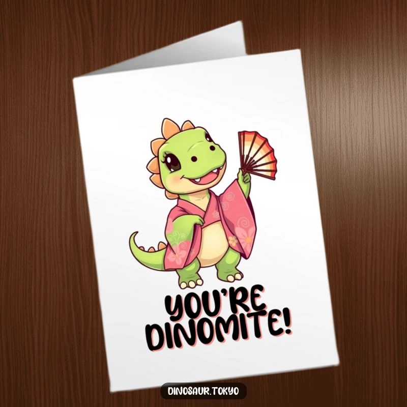Funny Free Printable Congratulations Card showing a cute dinosaur in a kimono twirling a fan, celebrating an achievement with pure delight.